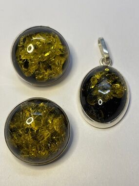 Olive Green Amber Cabochon Pendant and matching clip earrings set in silver